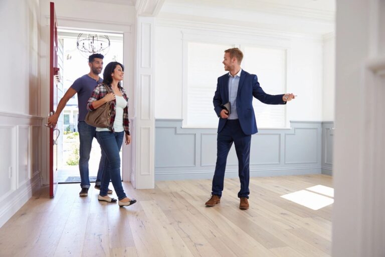 a couple inspecting a house