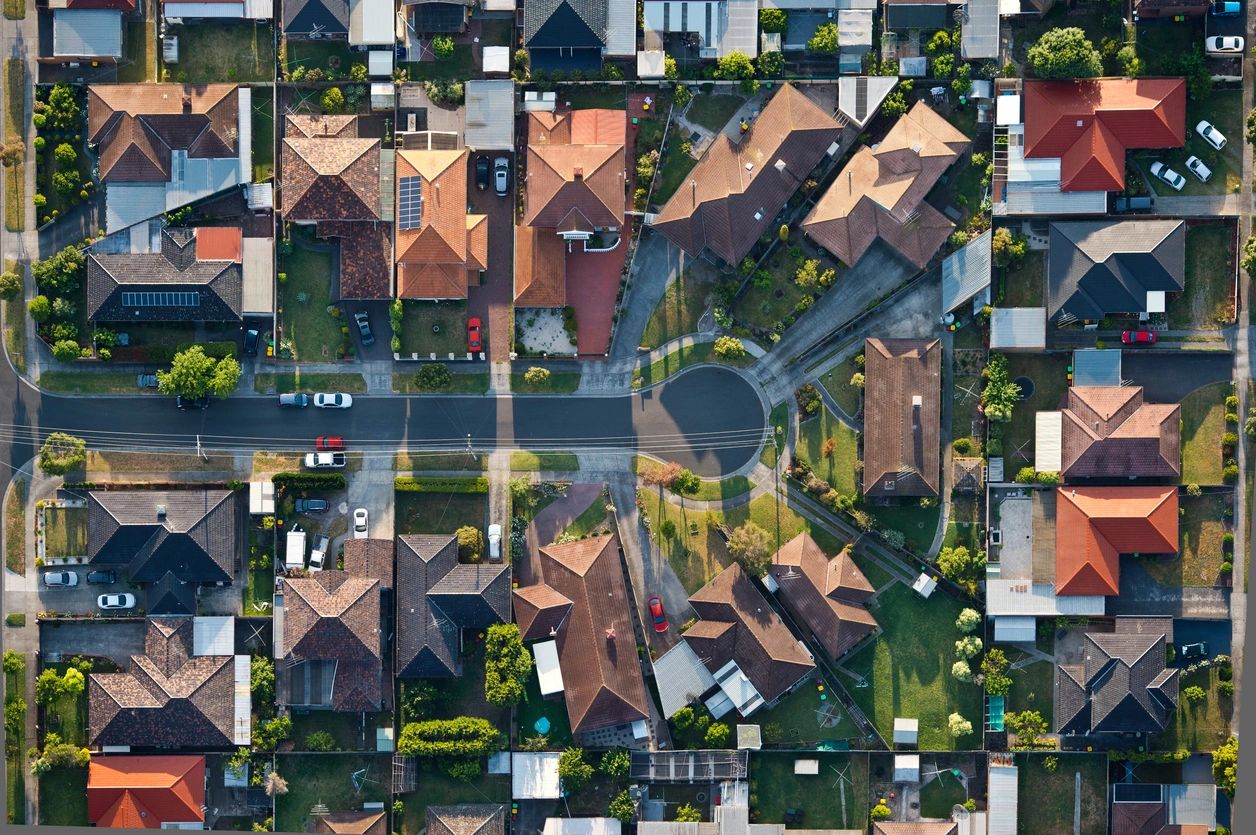 a birds eye view of suburban houses