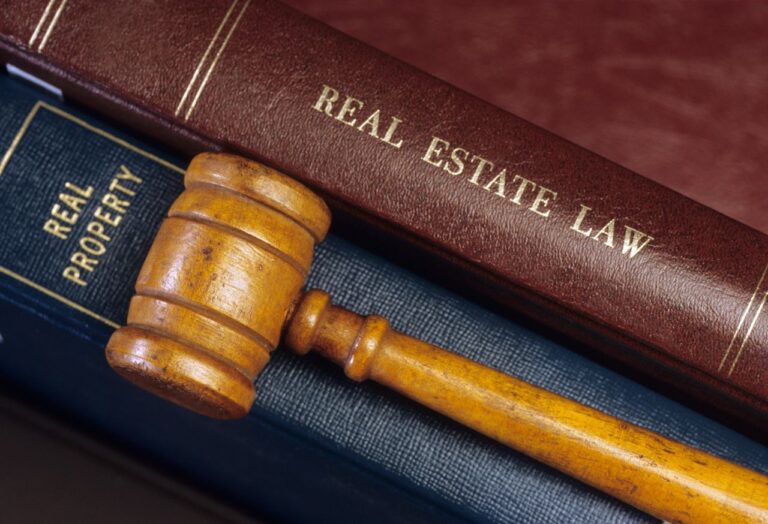 a gravel on top of property law books